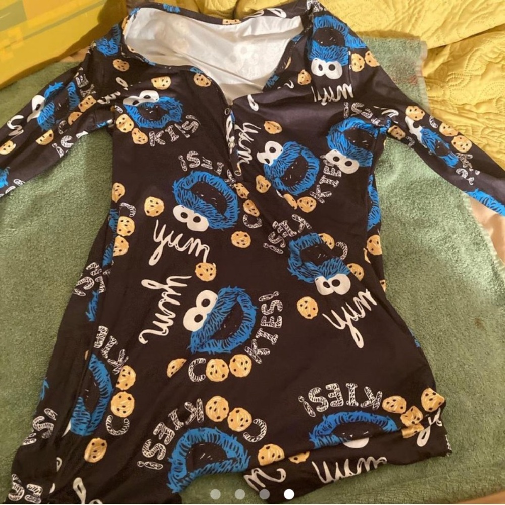 The size is a medium onesie pajama the color is black stretchy material